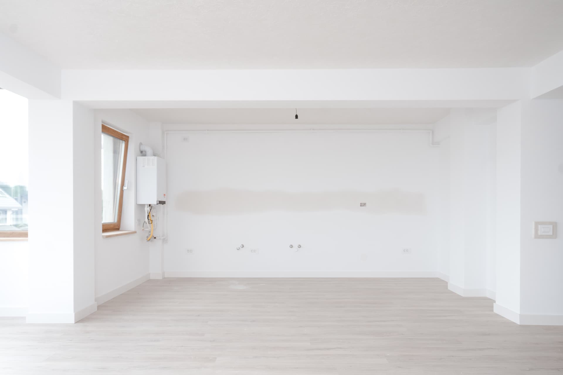 Zonă de bucătărie open-space cu centrală termică proprie